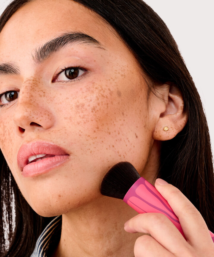 Close up of Model's face, cheek angle