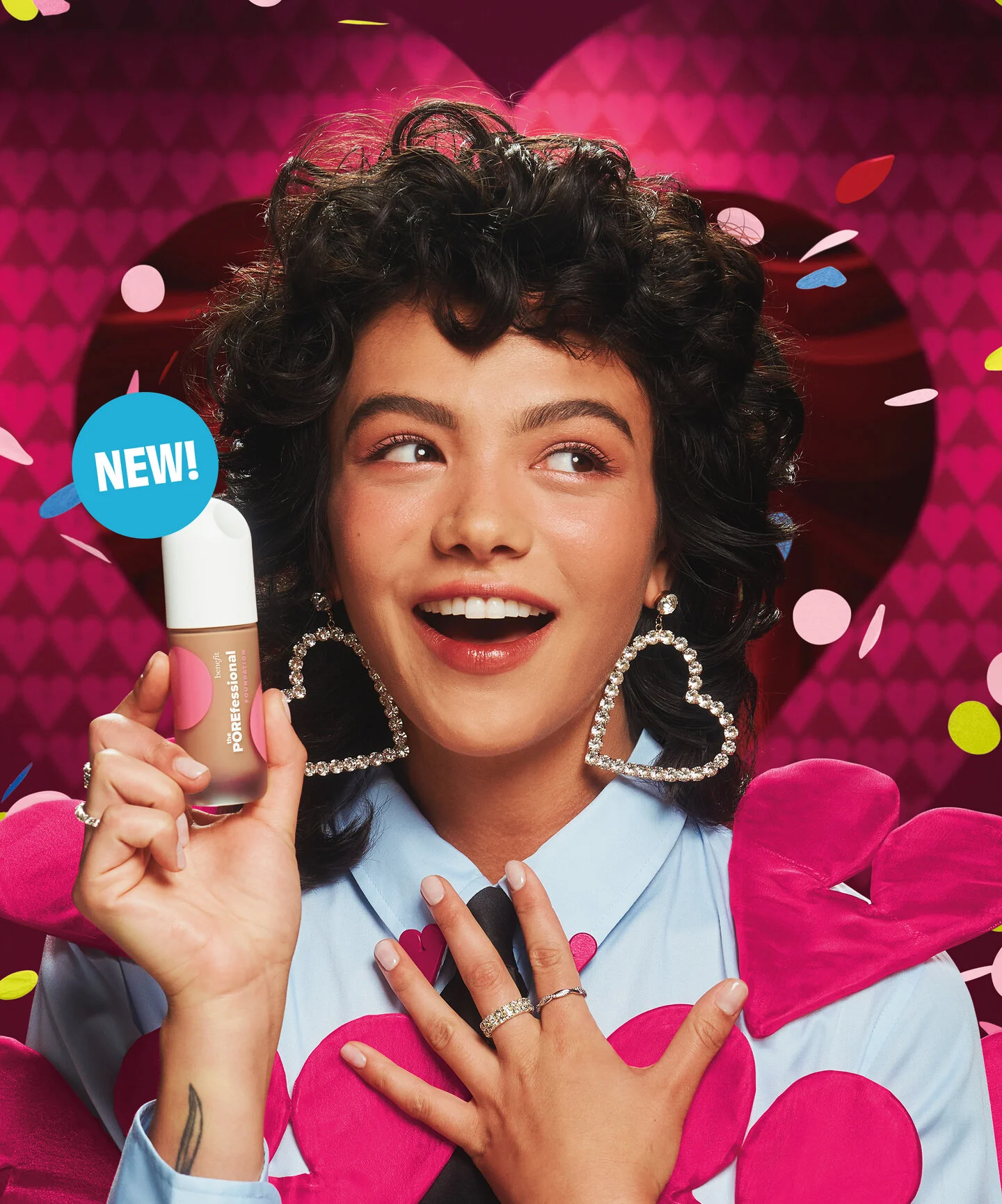 Model holding Foundation bottle