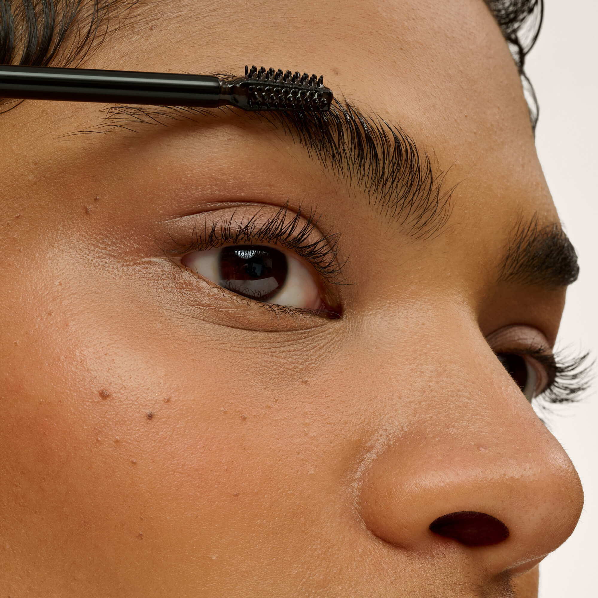 Brush through clean, dry brows