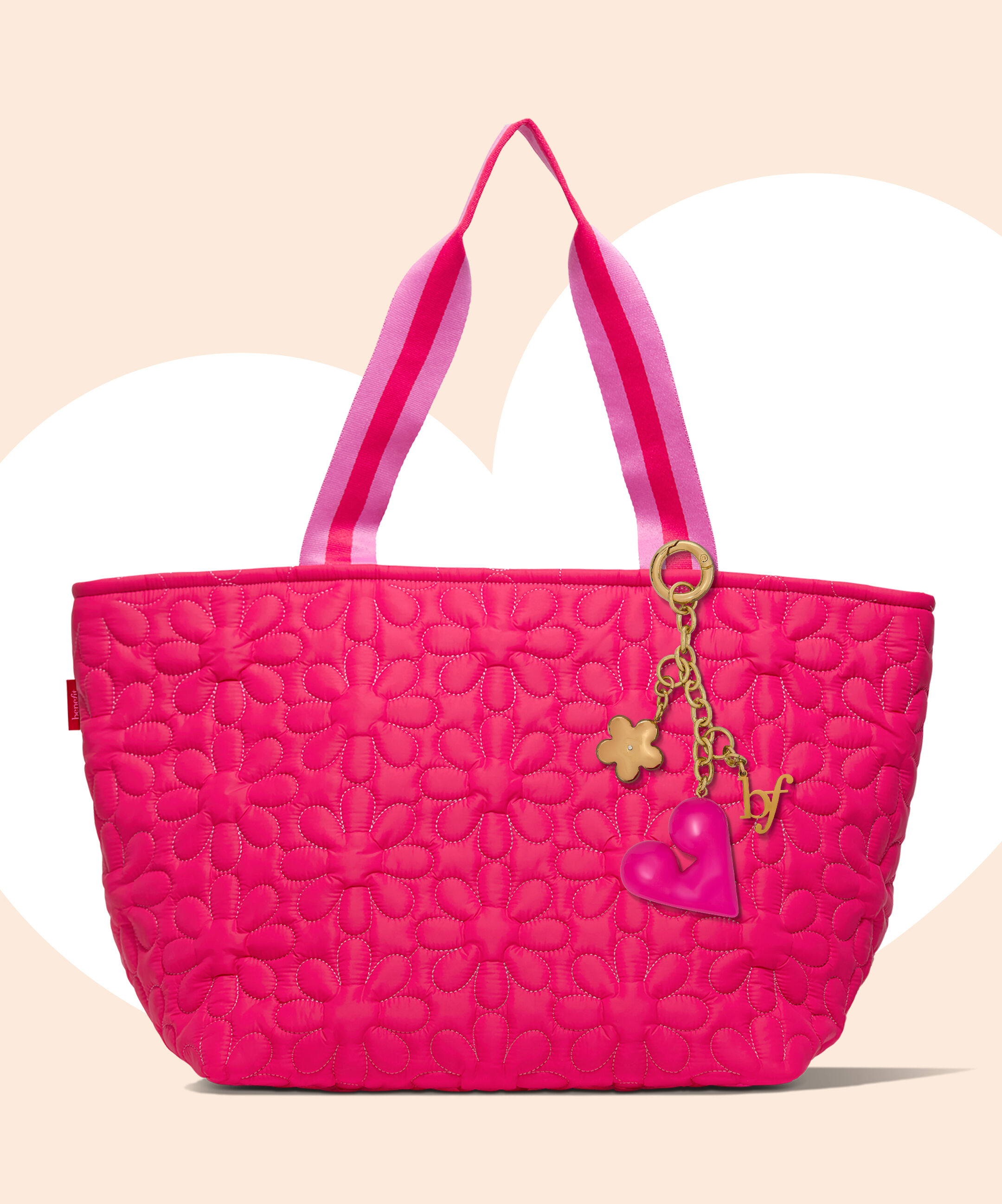 Score a free bag charm with your $85 haul, plus a quilted tote to actually hang it on. We thought of everything.  Code: BAGIT