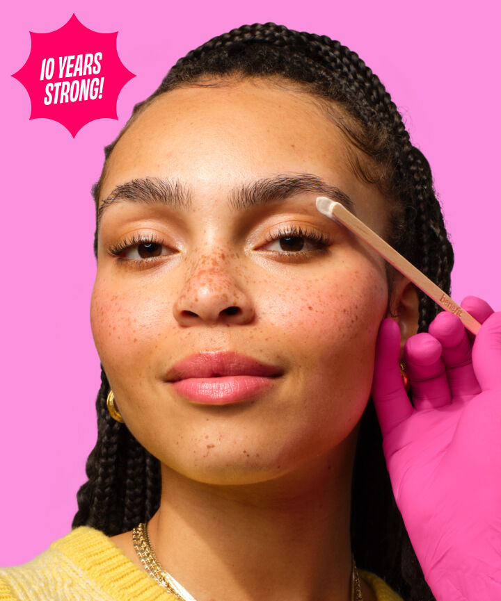 Model getting a brow wax