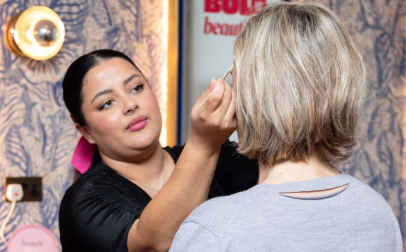 Beauty and Brow Expert performing brow wax